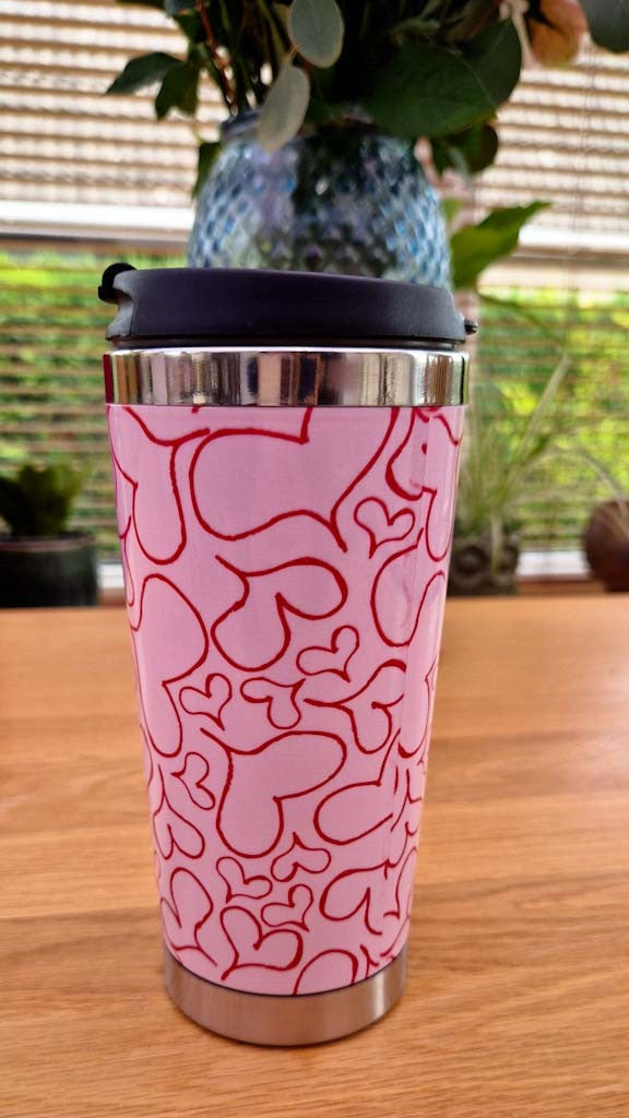 Reusable travel mug with Million Hearts design from Love Collection
