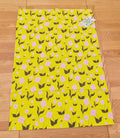 Cotton tea towel with First Flowers pattern in Sunshine Yellow 2025
