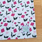 Organic cotton tea towel with First Flowers pattern in Tea Green