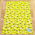 Organic cotton tea towel with First Flowers pattern in Sunshine Yellow