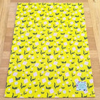 Organic cotton tea towel with First Flowers pattern in Sunshine Yellow