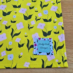 Organic cotton tea towel with First Flowers pattern in Sunshine Yellow