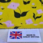 Organic cotton tea towel with First Flowers pattern in Sunshine Yellow