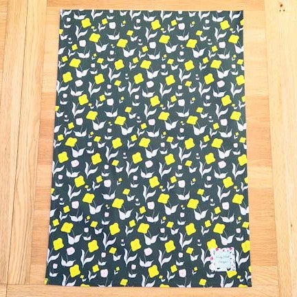 Organic cotton tea towel with First Flowers pattern in Forest Green
