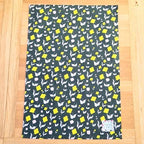 Organic cotton tea towel with First Flowers pattern in Forest Green