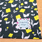 Organic cotton tea towel with First Flowers pattern in Forest Green