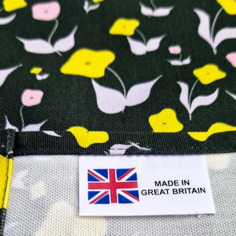 Organic cotton tea towel with First Flowers pattern in Forest Green