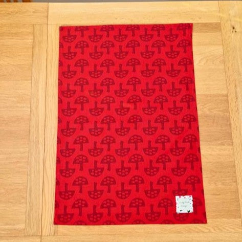 Organic cotton tea towel with Glen Tanar Mushrooms pattern in Light Berry
