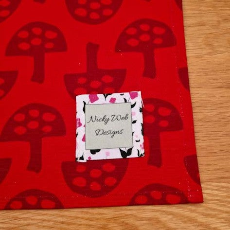 Organic cotton tea towel with Glen Tanar Mushrooms pattern in Light Berry