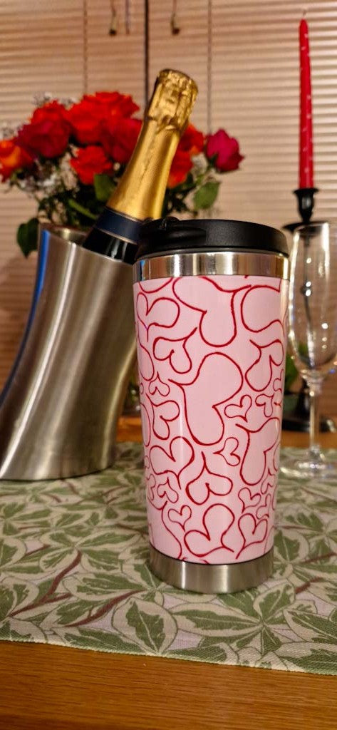 Reusable travel mug with Million Hearts design from Love Collection
